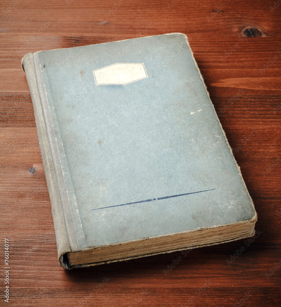 Book blank on old wood background Book blank on old wood background