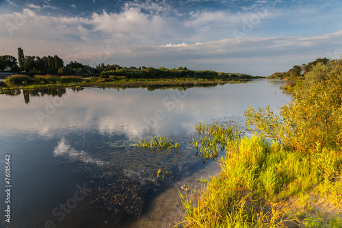 Beautiful summer water landscape in sunbeam © Dmytro Kosmenko
