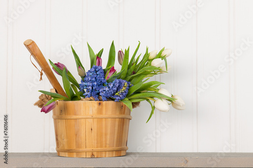 Fototapeta Naklejka Na Ścianę i Meble -  Sauna bucket with bouquet flowers