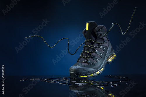mountain boots on a dark background