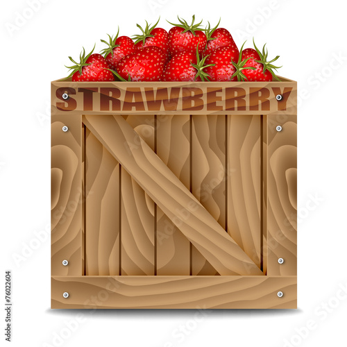 Strawberries in wooden box isolated on white