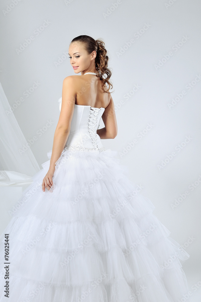 Fototapeta premium Beautiful girl in wedding dress