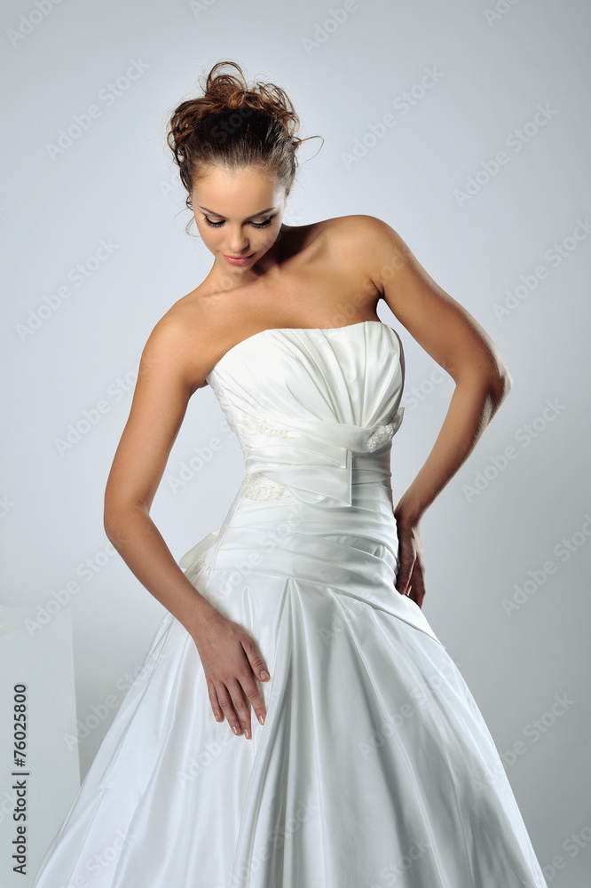 Slim beautiful woman wearing luxurious wedding dress Slim beautiful woman wearing luxurious wedding dress