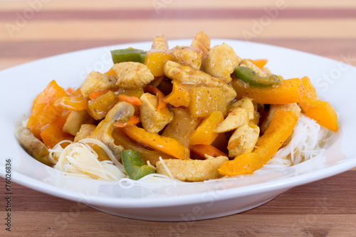 chicken and mango curry on rice noodle