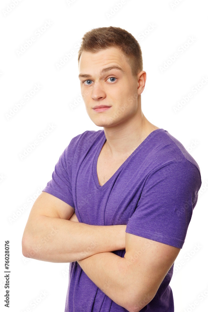 Obraz premium Young man in violet shirt in white background