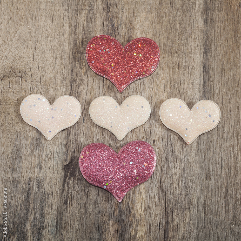 Fototapeta premium Hearts on the wooden