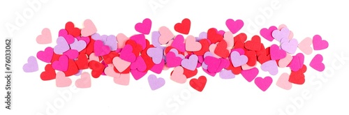 Valentines Day border of colorful paper hearts over white
