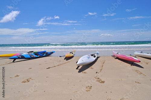 Colorful kayaks on the tropical beach. Gold Coast, Australia