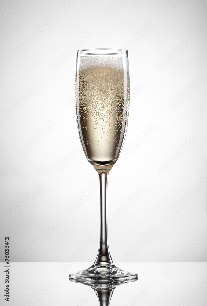 champagne in glass isolated on white champagne in glass isolated on white