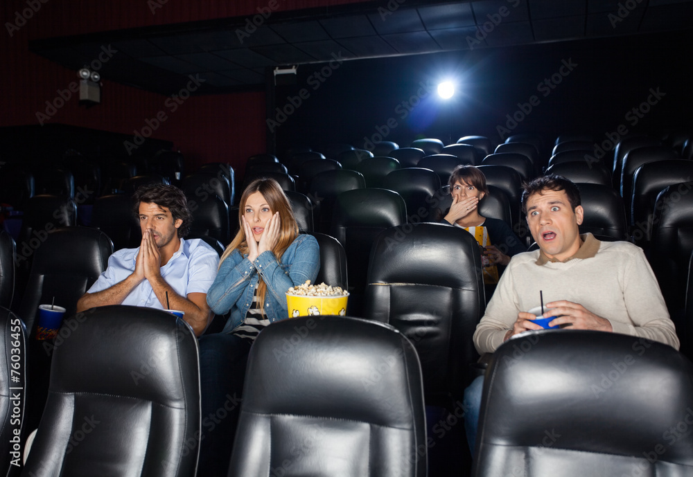 Naklejka premium Shocked People Watching Film
