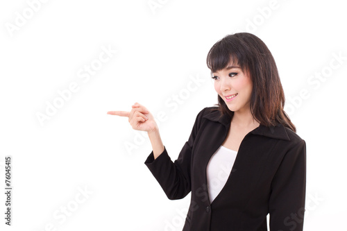 young business woman point her finger sideward to blank space