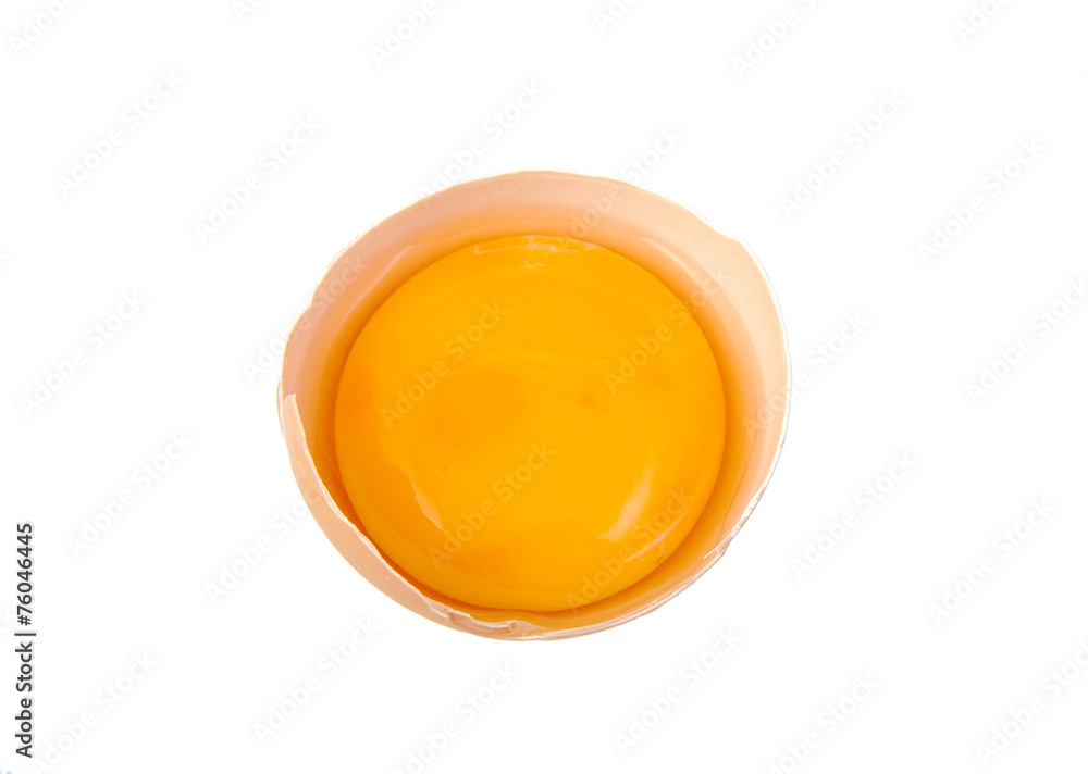 Yolk in broken egg isolated on white background. Yolk in broken egg isolated on white background.
