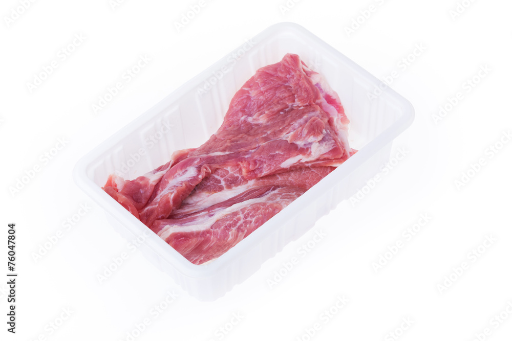 raw pork in plastic box package isolated on white background raw pork in plastic box package isolated on white background