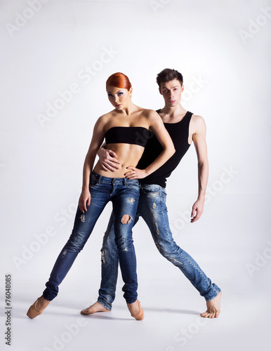 Couple of modern ballet dancers in jeans