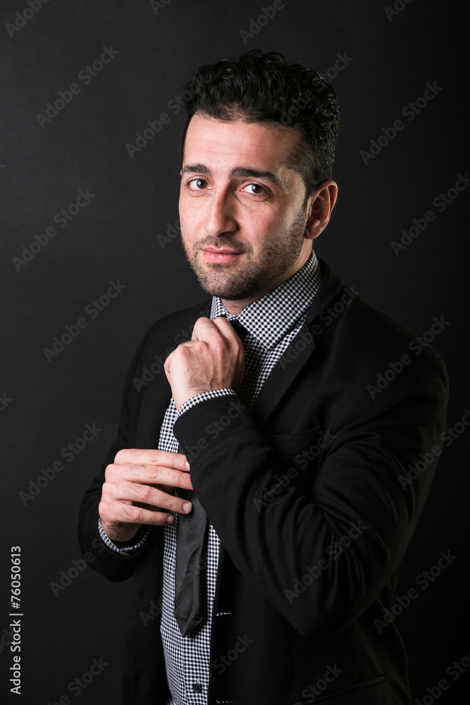 Portrait of Young Man Wearing Shirt on Black Plain Background Portrait of Young Man Wearing Shirt on Black Plain Background