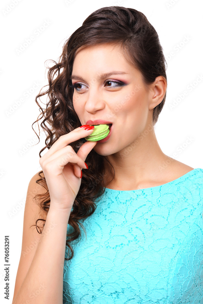Young beautiful girl with tasty macaroon isolated Young beautiful girl with tasty macaroon isolated