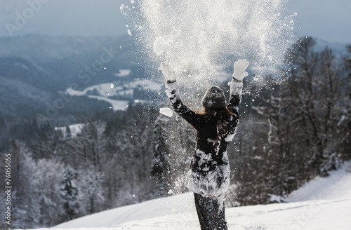 Woman enjoying in snow. © Matic Štojs Lomovšek
