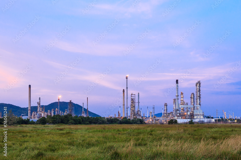 Oil refinery plant at twilight night