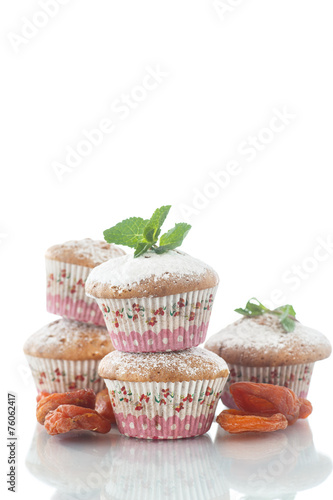 Fototapeta Naklejka Na Ścianę i Meble -  sweet muffins with dried apricots and sugar