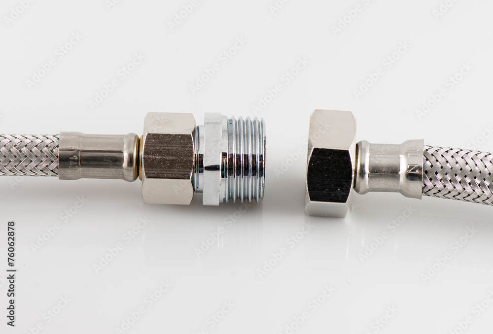elastic metal fiber water pipe with connectors on white elastic metal fiber water pipe with connectors on white