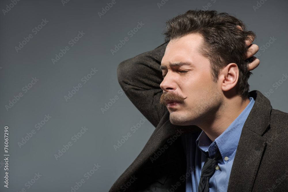 Side view of young author deep in thoughts Side view of young author deep in thoughts