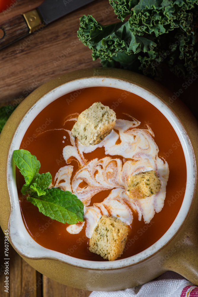 close view on fresh tomato soup with cream close view on fresh tomato soup with cream