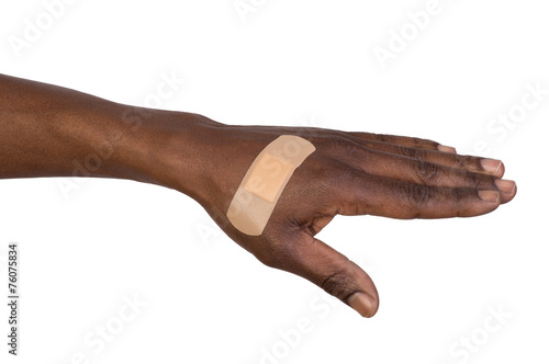 Hand with adhesive bandage photo