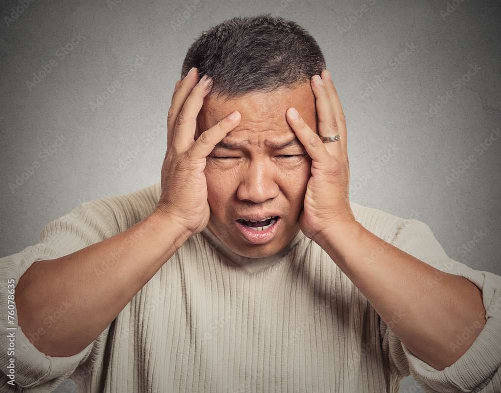 Fototapeta premium upset stressed out sick tired middle aged man having headache