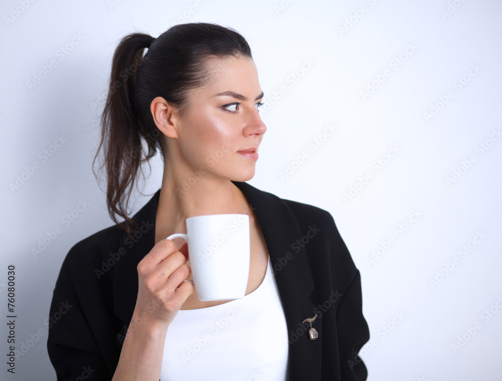 Young woman holding a mug, isolated on white background Young woman holding a mug, isolated on white background