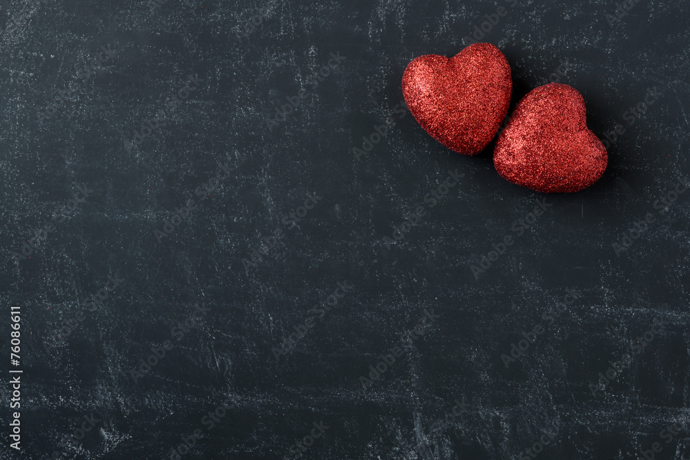 Obraz premium Red Hearts on a Chalkboard for Valentines Day