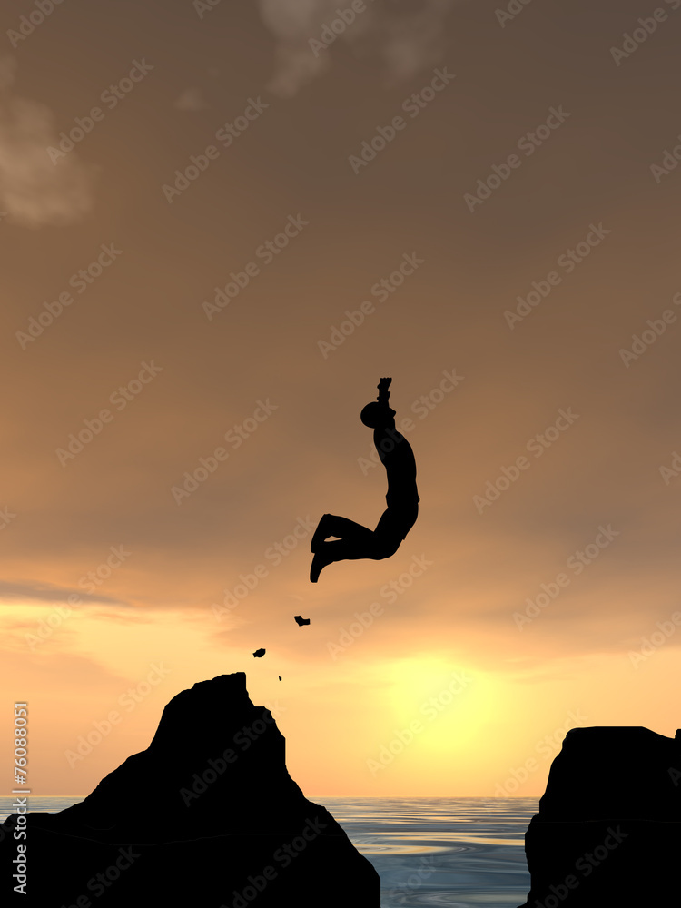 Human man silhouette jumping at sunset