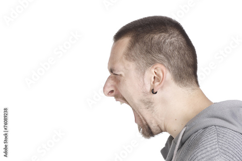 Side portrait of a shouting man