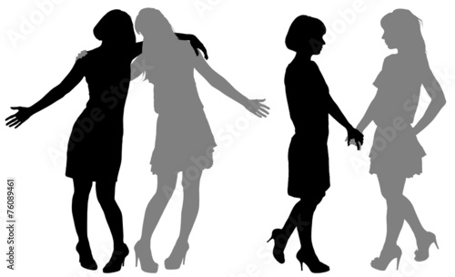 silhouette of two young women