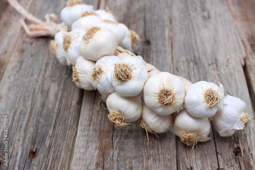 garlic brunch closeup wood old background rustic