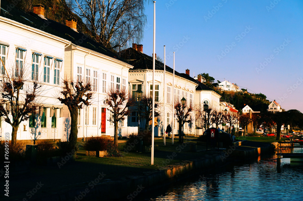 Naklejka premium Street with old port buildings along the wharf