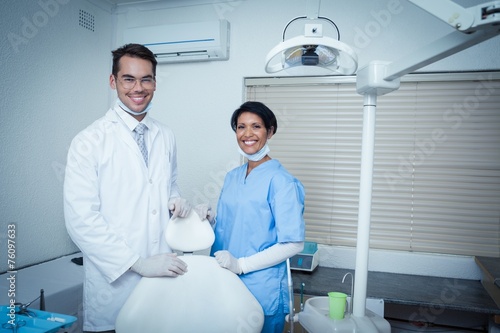 Fototapeta Naklejka Na Ścianę i Meble -  Portrait of smiling dentists