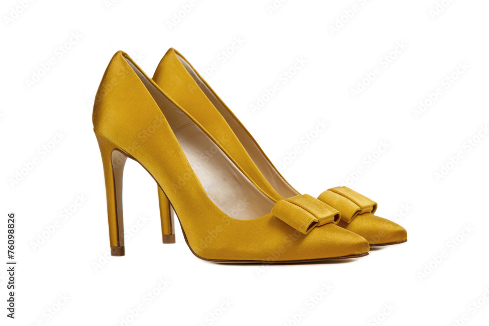 Zapatos amarillos de mujer sobre blanco liso y aislado. Vista de Copy space Stock Photo | Adobe Stock