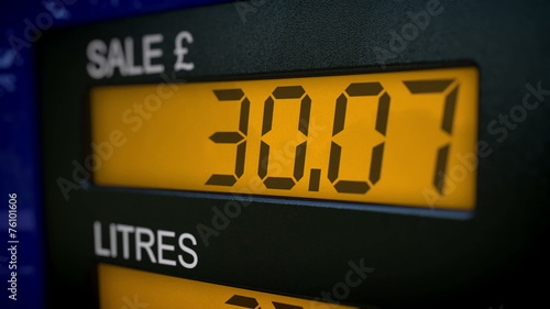 Time lapse on display showing UK petrol price increasing rapidly