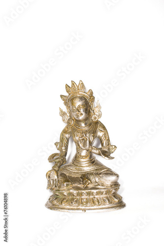 Statuette of Green Tara on a white background