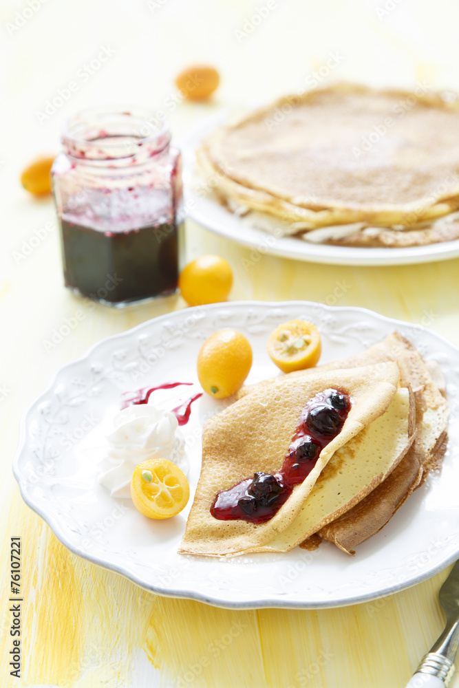 Pancakes with currant and kumquats jam