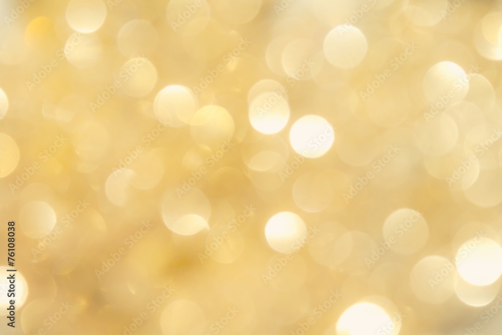 Golden bokeh lights background Golden bokeh lights background