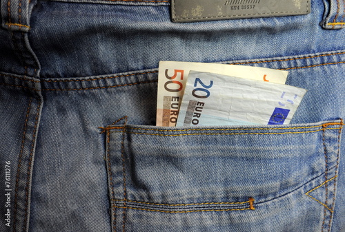 Euro money in pocket financial concept