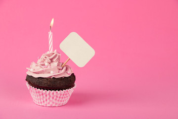 Pink birthday cupcake with placard