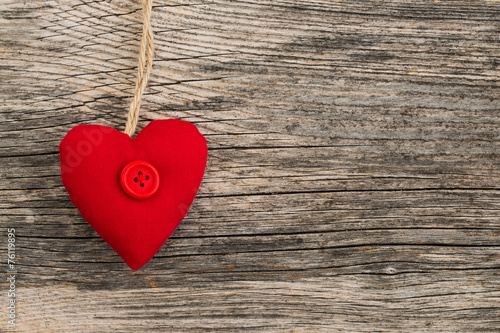 Valentines day red heart on wooden background