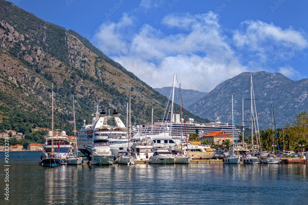 Kotor bay with pier and boats in Perast, Montenegro.