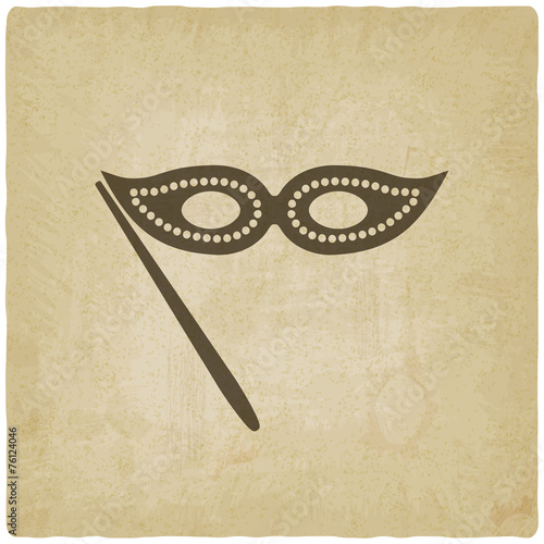 Masquerade mask symbol old background