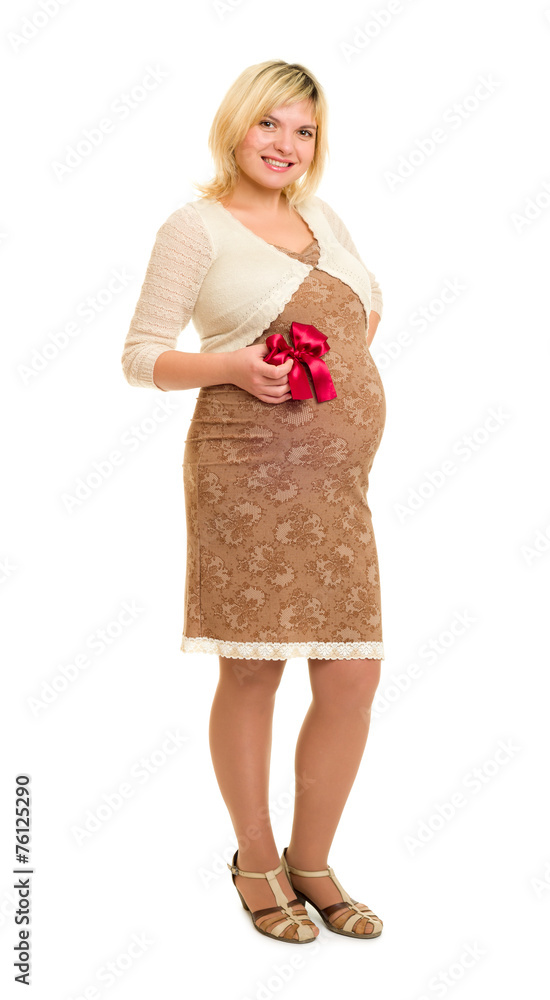 Pregnant woman in brown dress with red bow Pregnant woman in brown dress with red bow
