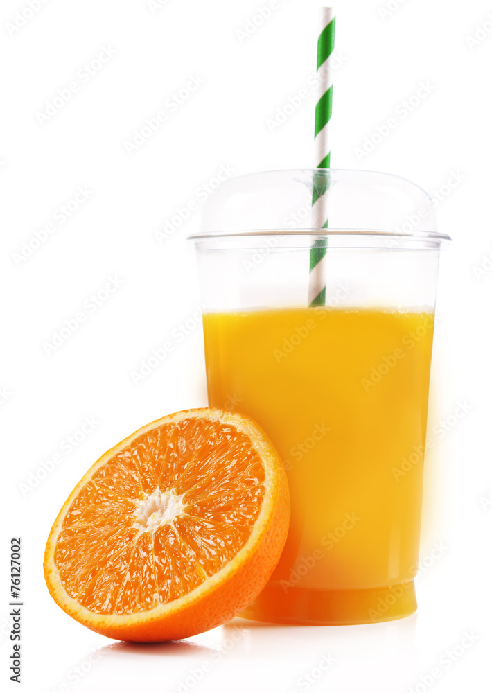 Orange juice in fast food closed cup with tube and slice of Orange juice in fast food closed cup with tube and slice of