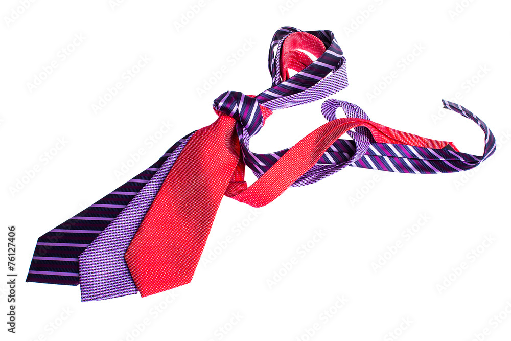 men's ties knotted on a white background
