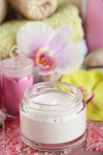 Spa treatments and cream with orchid flower extract, close-up